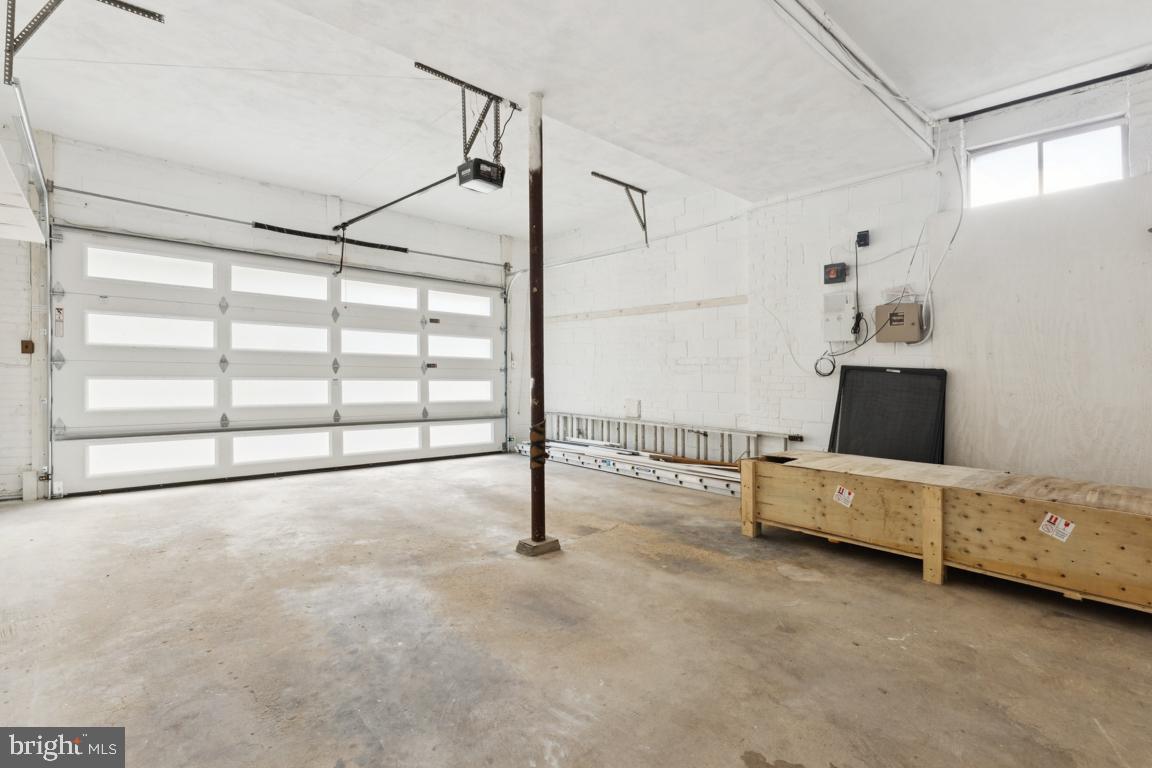 3209 Military Road Arlington, VA 22207 - Photo 40 of 45 a spacious bedroom with a bed and a large window