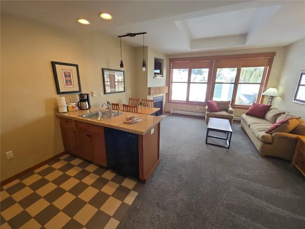 a living room with a couch and a table