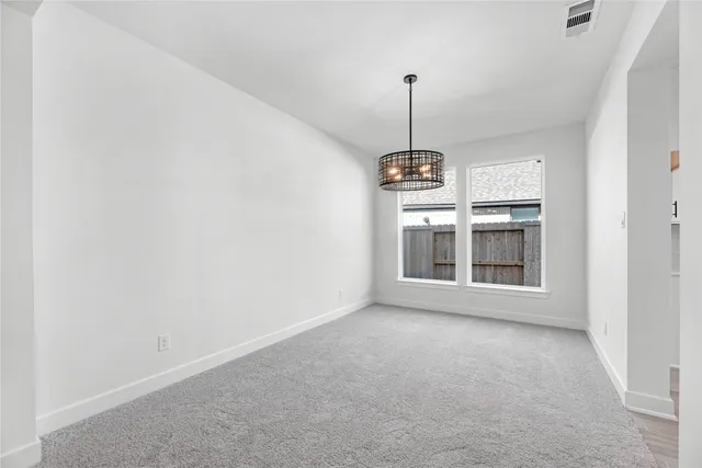 a view of a room with windows