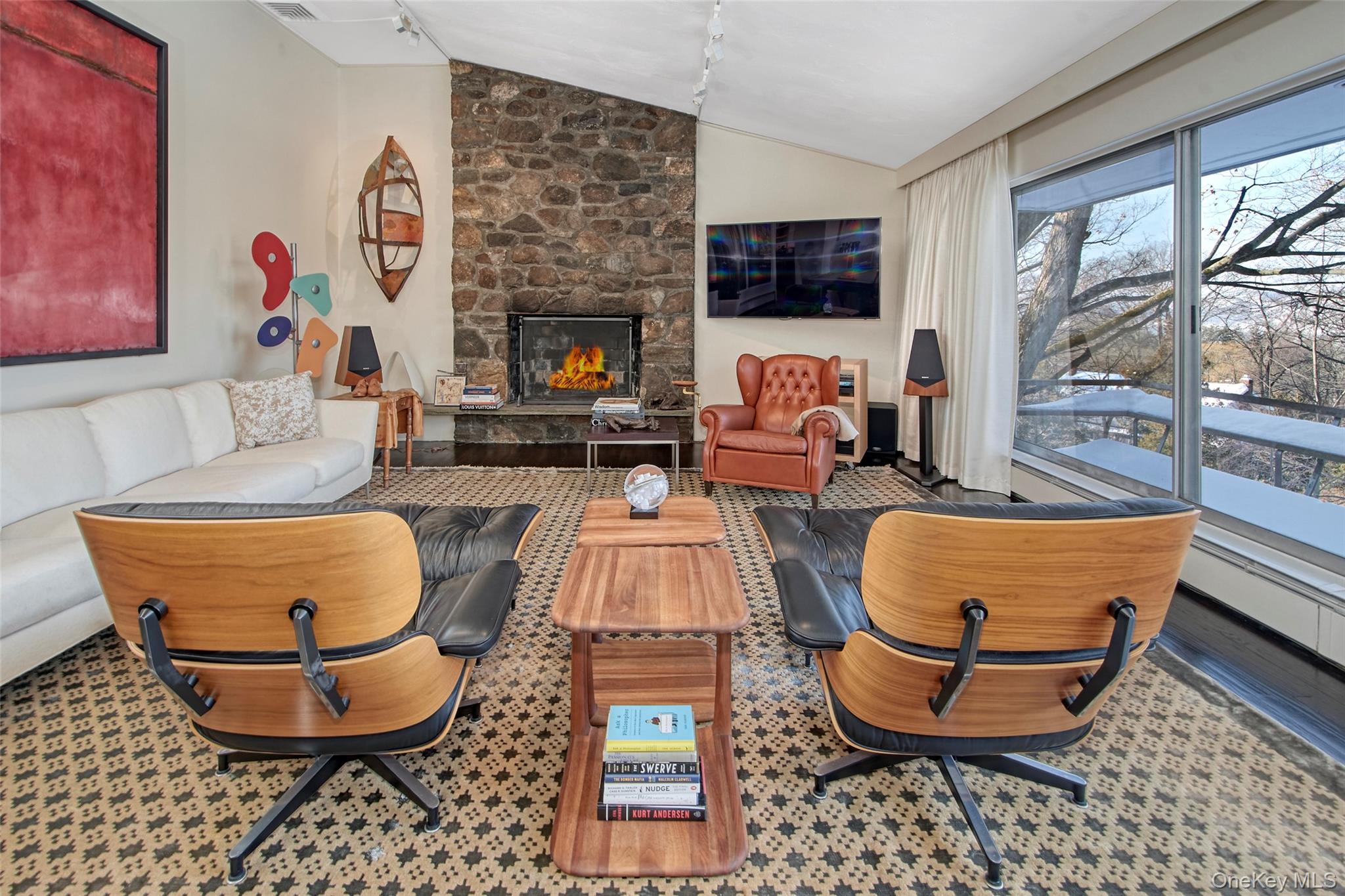 132 Ridgecrest Road Briarcliff Manor, NY 10510 - Photo 13 of 48 a living room with furniture and a fireplace