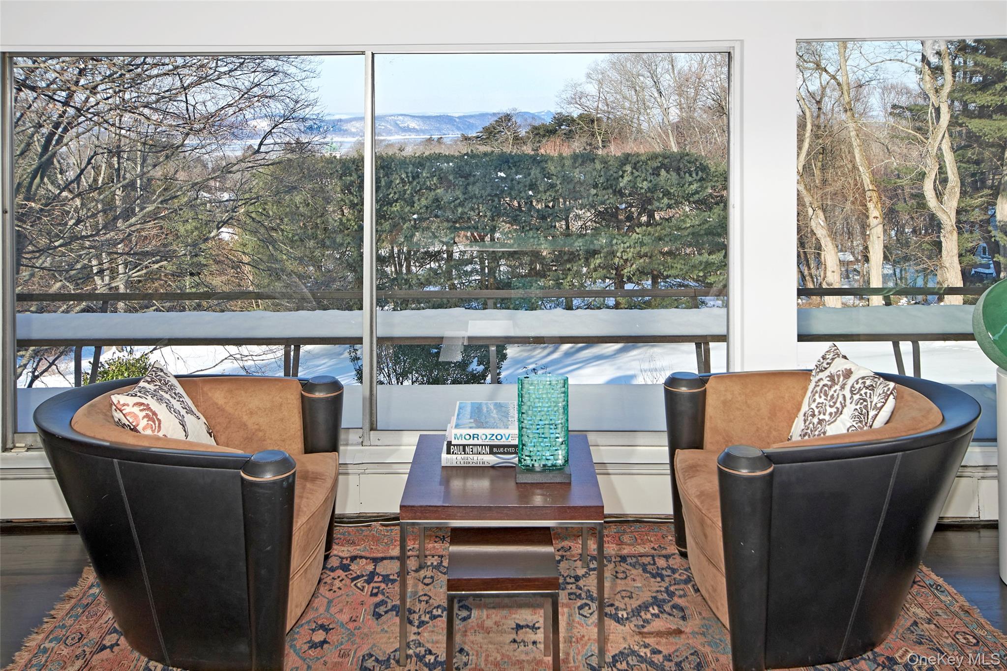 132 Ridgecrest Road Briarcliff Manor, NY 10510 - Photo 19 of 50 a living room with furniture and a potted plant