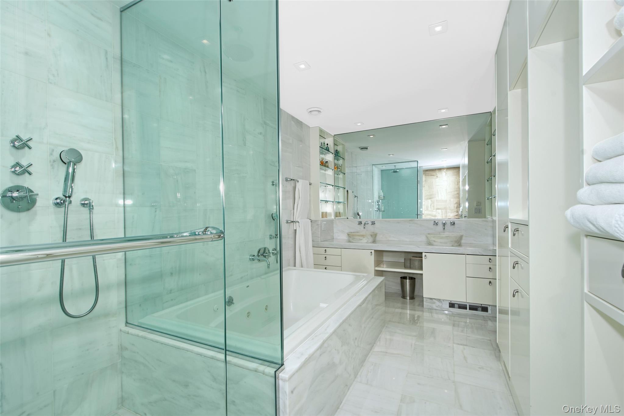 132 Ridgecrest Road Briarcliff Manor, NY 10510 - Photo 34 of 48 a bathroom with a shower sink and mirror
