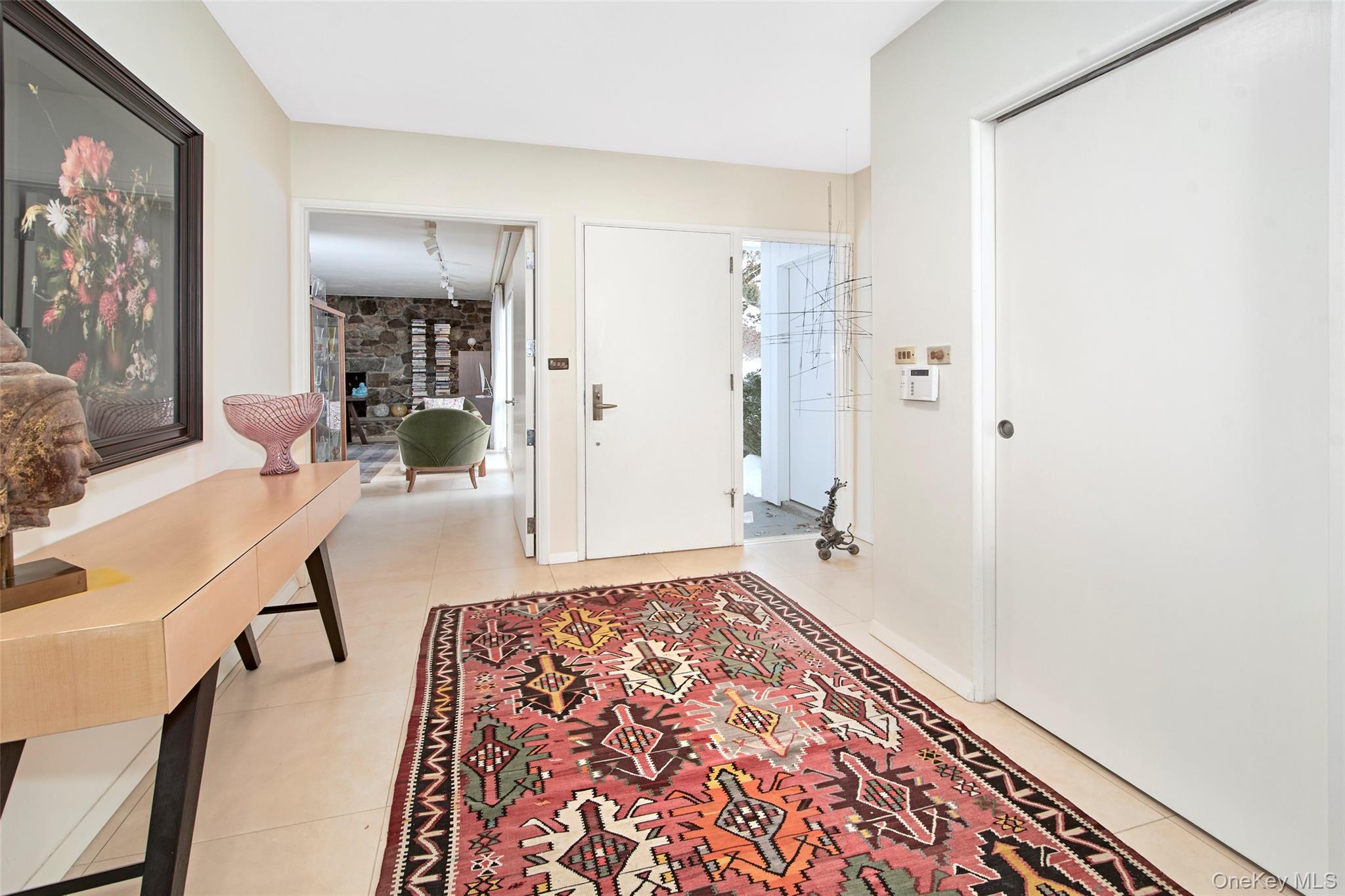 132 Ridgecrest Road Briarcliff Manor, NY 10510 - Photo 9 of 50 a living room with furniture and a rug