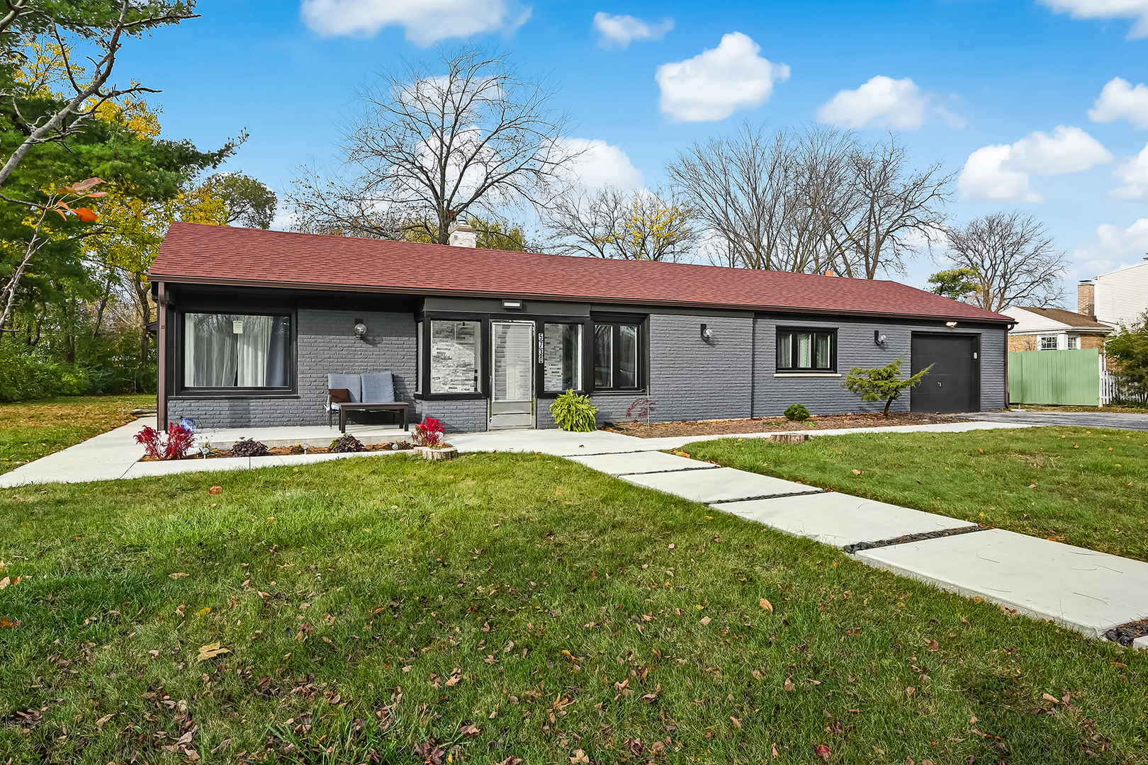 5730 Kensington Avenue Countryside, IL 60525 - Photo 1 of 20 a house view with swimming pool and garden view