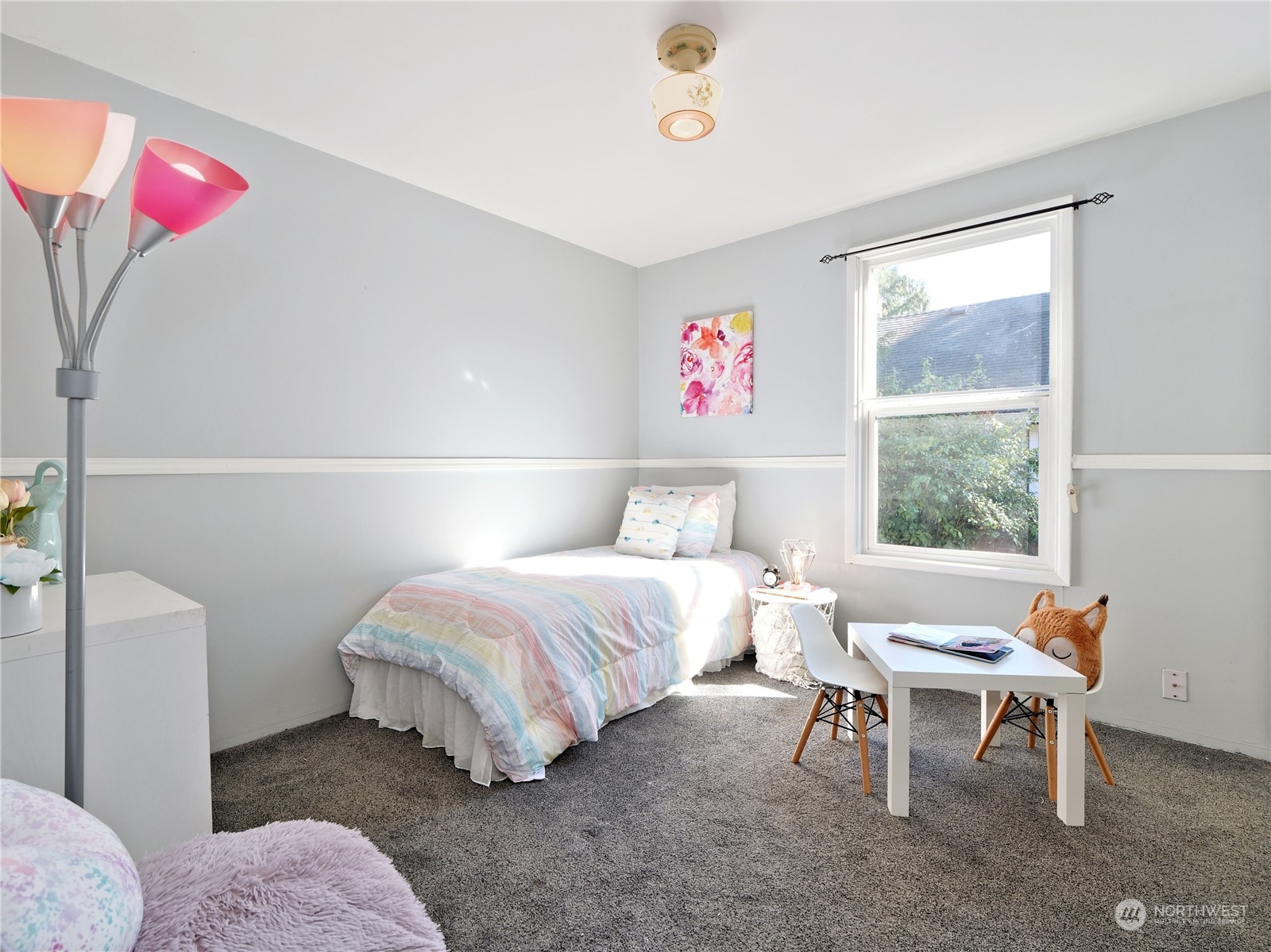 515 Wells Avenue South Renton, WA 98057 - Photo 15 of 25 a bedroom with a bed and a window