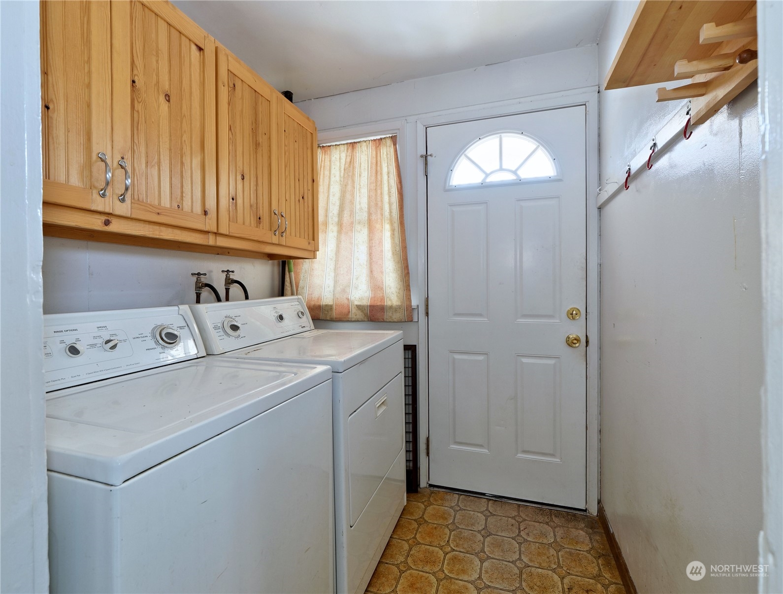 515 Wells Avenue South Renton, WA 98057 - Photo 17 of 25 a room with storage and utility