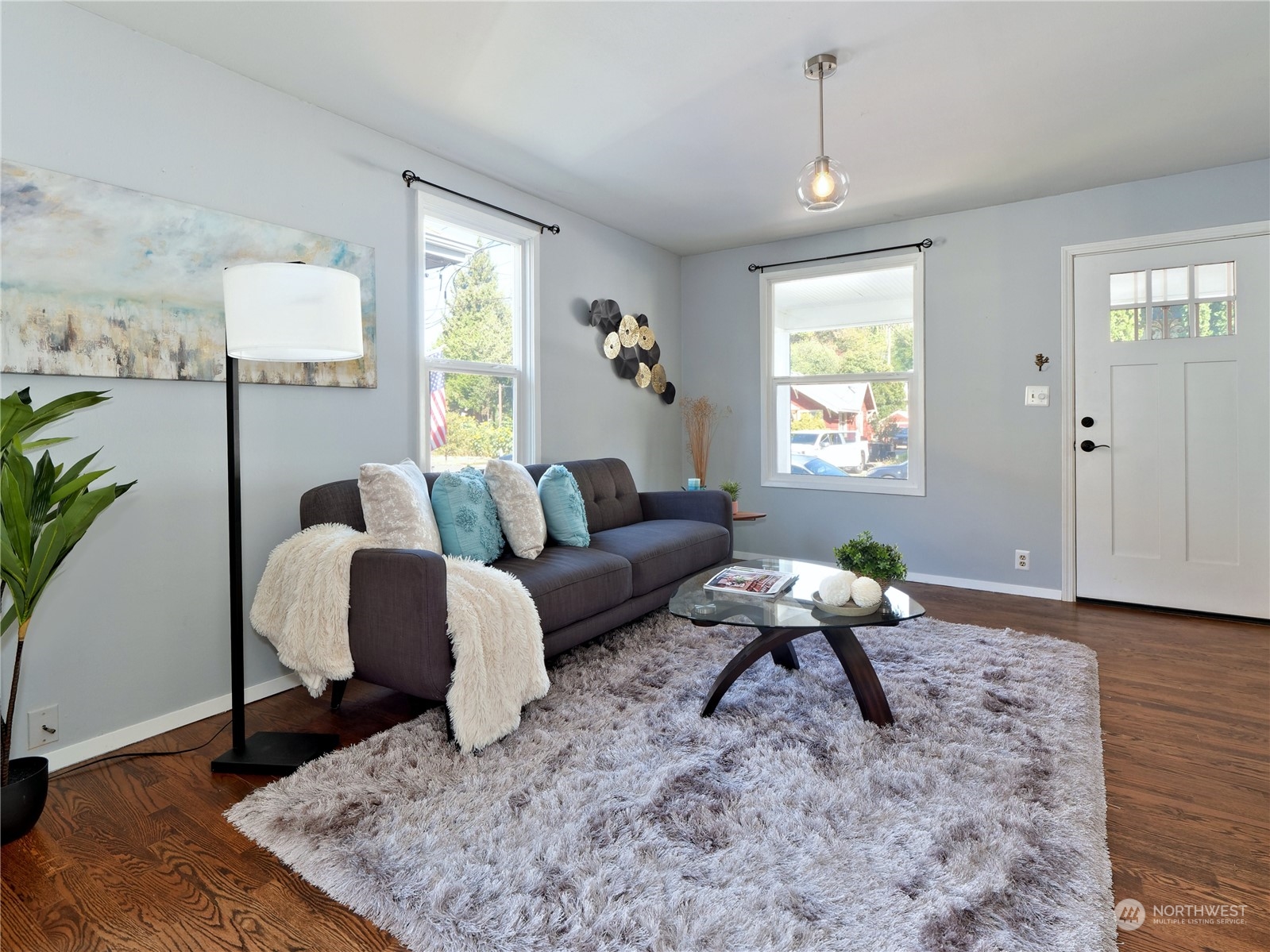 515 Wells Avenue South Renton, WA 98057 - Photo 3 of 25 a living room with furniture rug and window