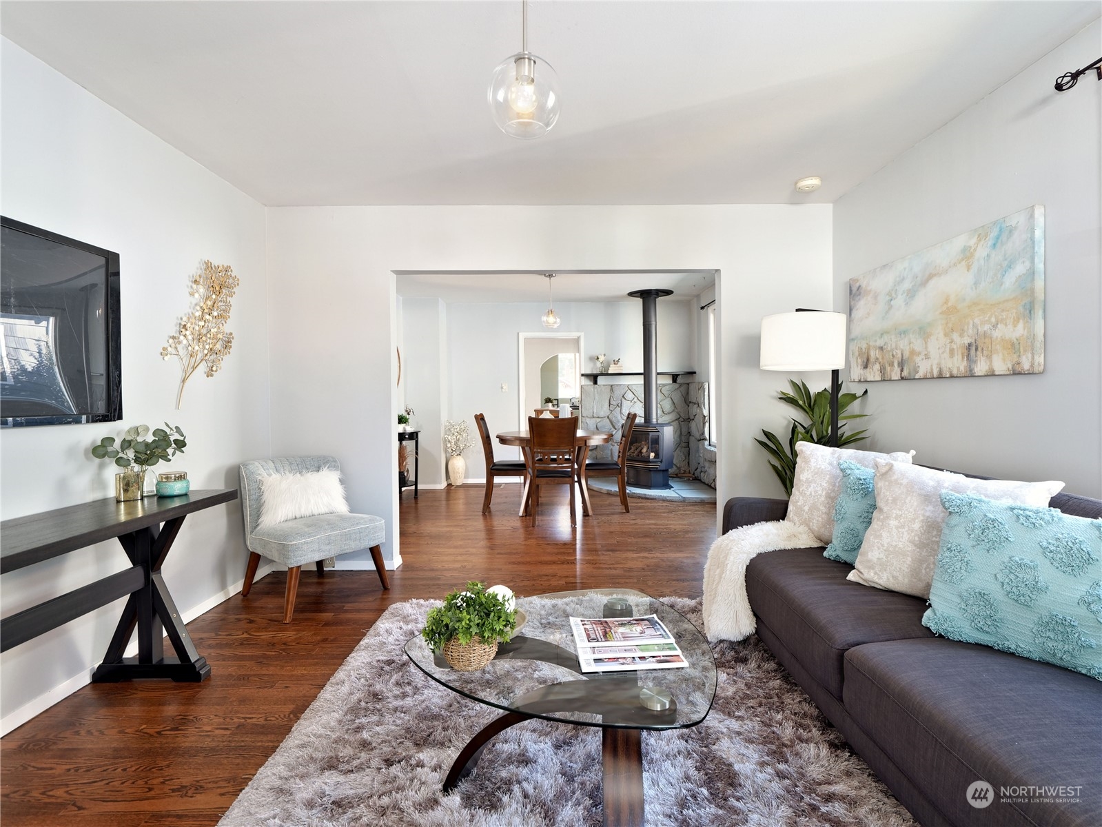 515 Wells Avenue South Renton, WA 98057 - Photo 5 of 25 a living room with furniture and wooden floor