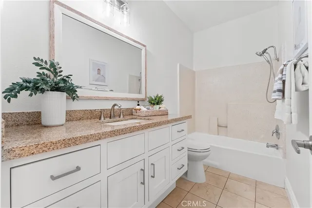 a view of a city with mountains in the background