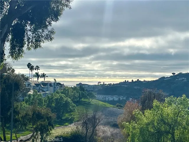 a room with wooden floor and furniture