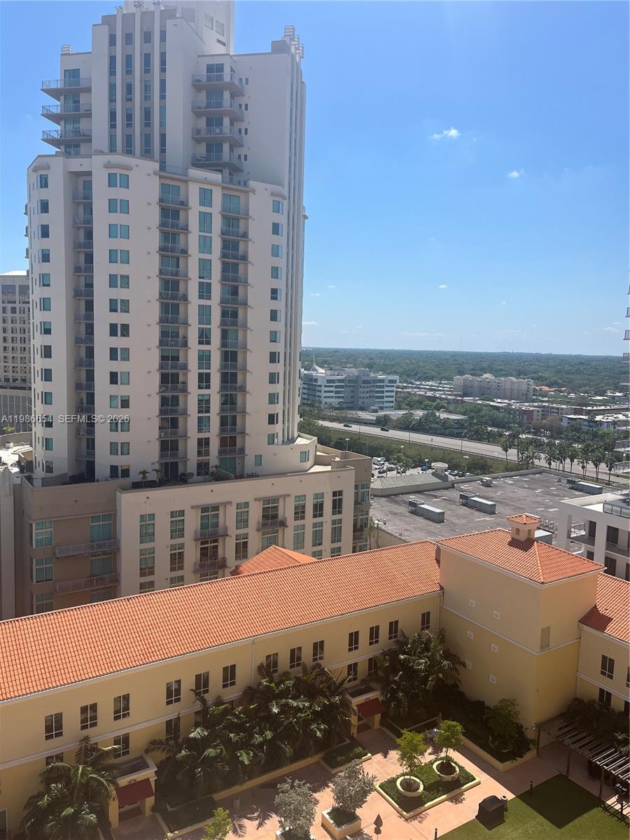 7350 Southwest 89th Street, Unit 1801S Miami, FL 33156 - Photo 2 of 15 a view of a tall building