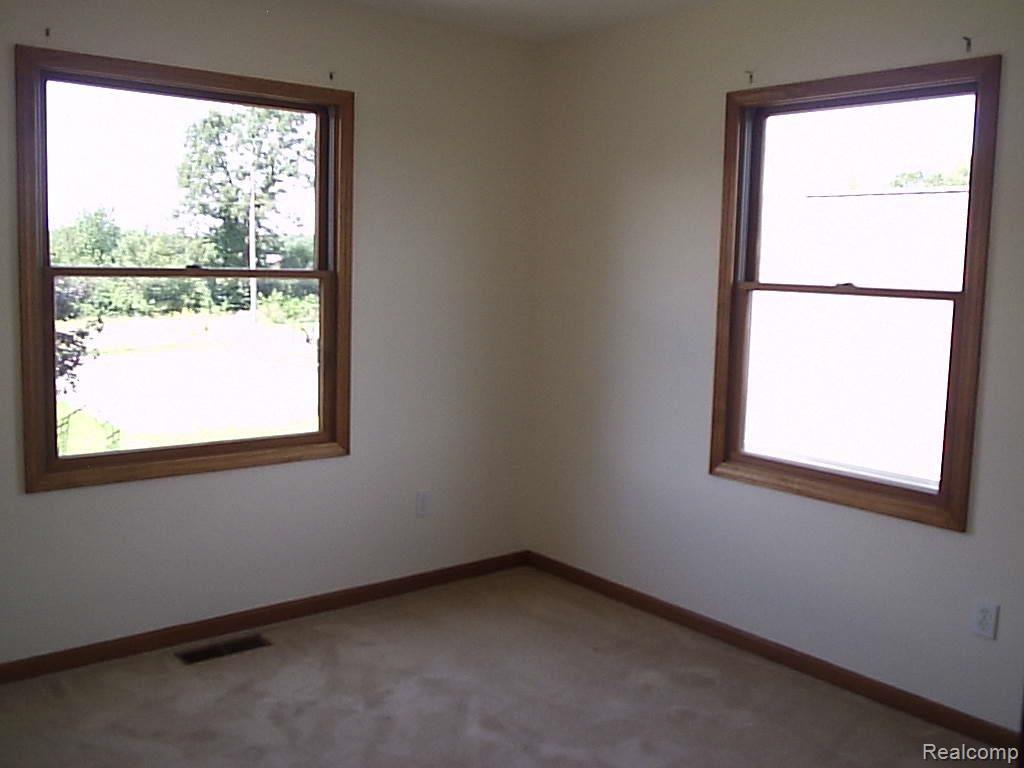 1728 County Farm Road Howell, MI 48843 - Photo 8 of 22 Bedroom 3