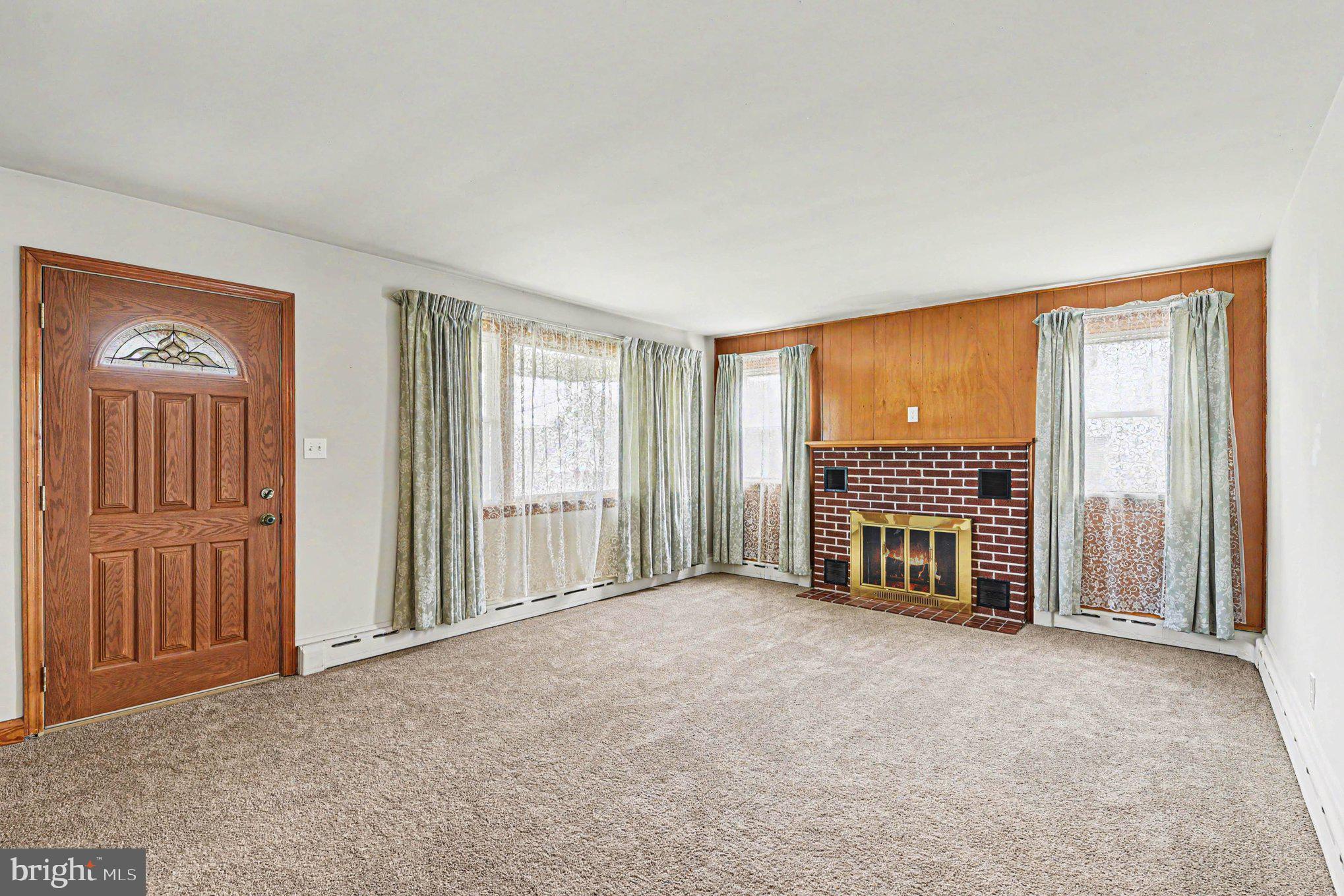 4125 Cliffvale Road Nottingham, MD 21236 - Photo 18 of 24 Cozy living space with inviting warmth.