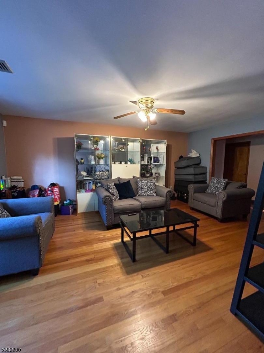 328 West Inman Avenue Rahway, NJ 07065 - Photo 2 of 9 a living room with furniture and a wooden floor