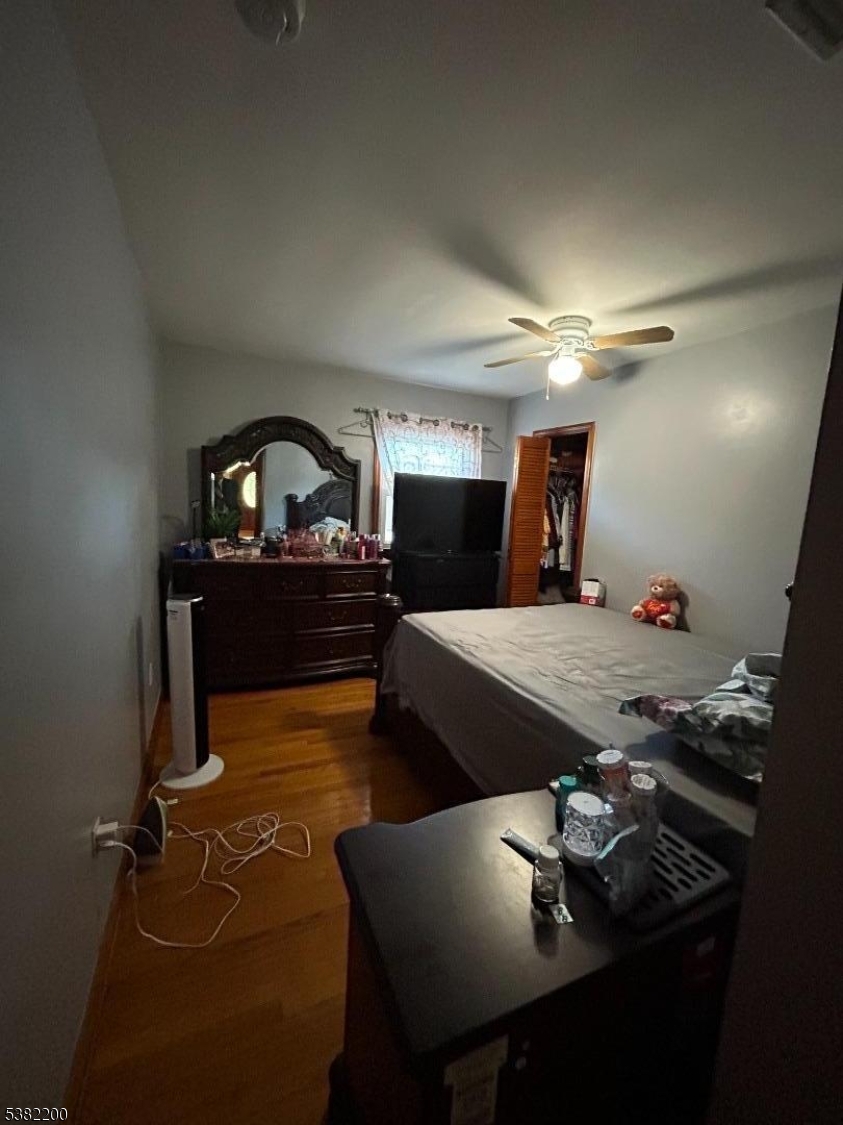 328 West Inman Avenue Rahway, NJ 07065 - Photo 9 of 9 a dining room with furniture and a chandelier