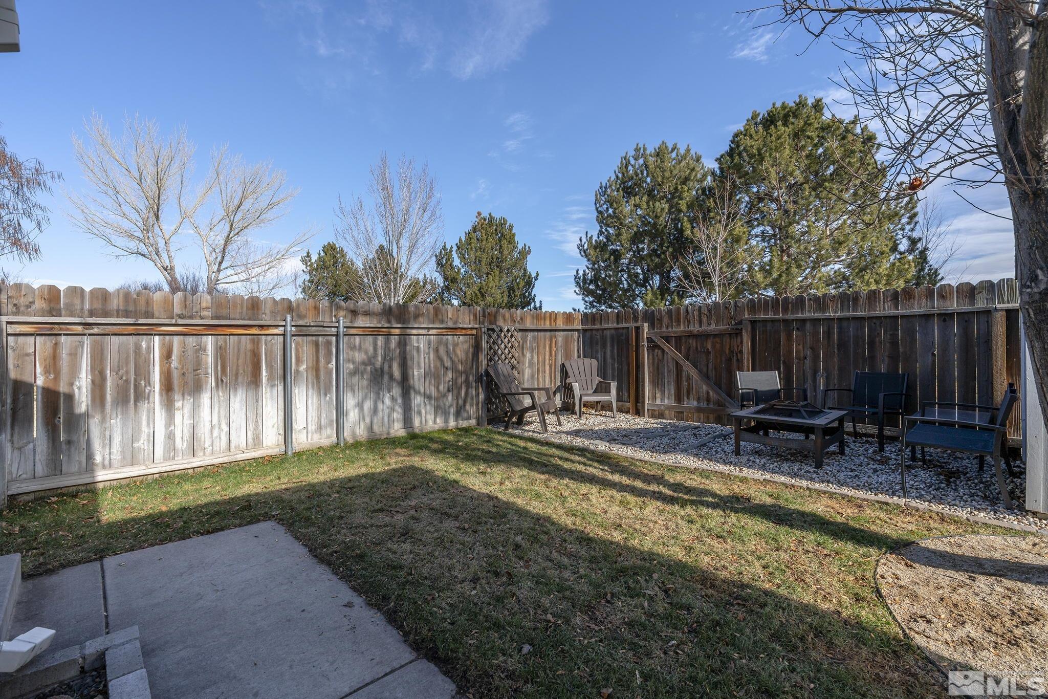 7630 Water View Way Reno, NV 89511 - Photo 24 of 25 a view of a backyard with sitting area and furniture