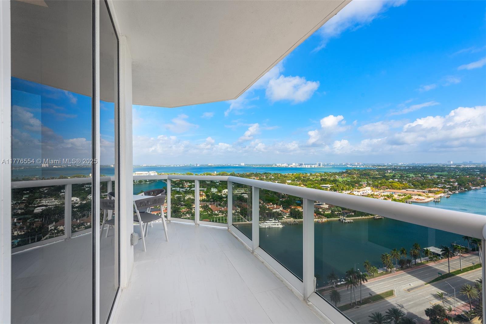 4775 Collins Avenue, Unit 2607 Miami Beach, FL 33140 - Photo 24 of 48 a view of a city from a balcony