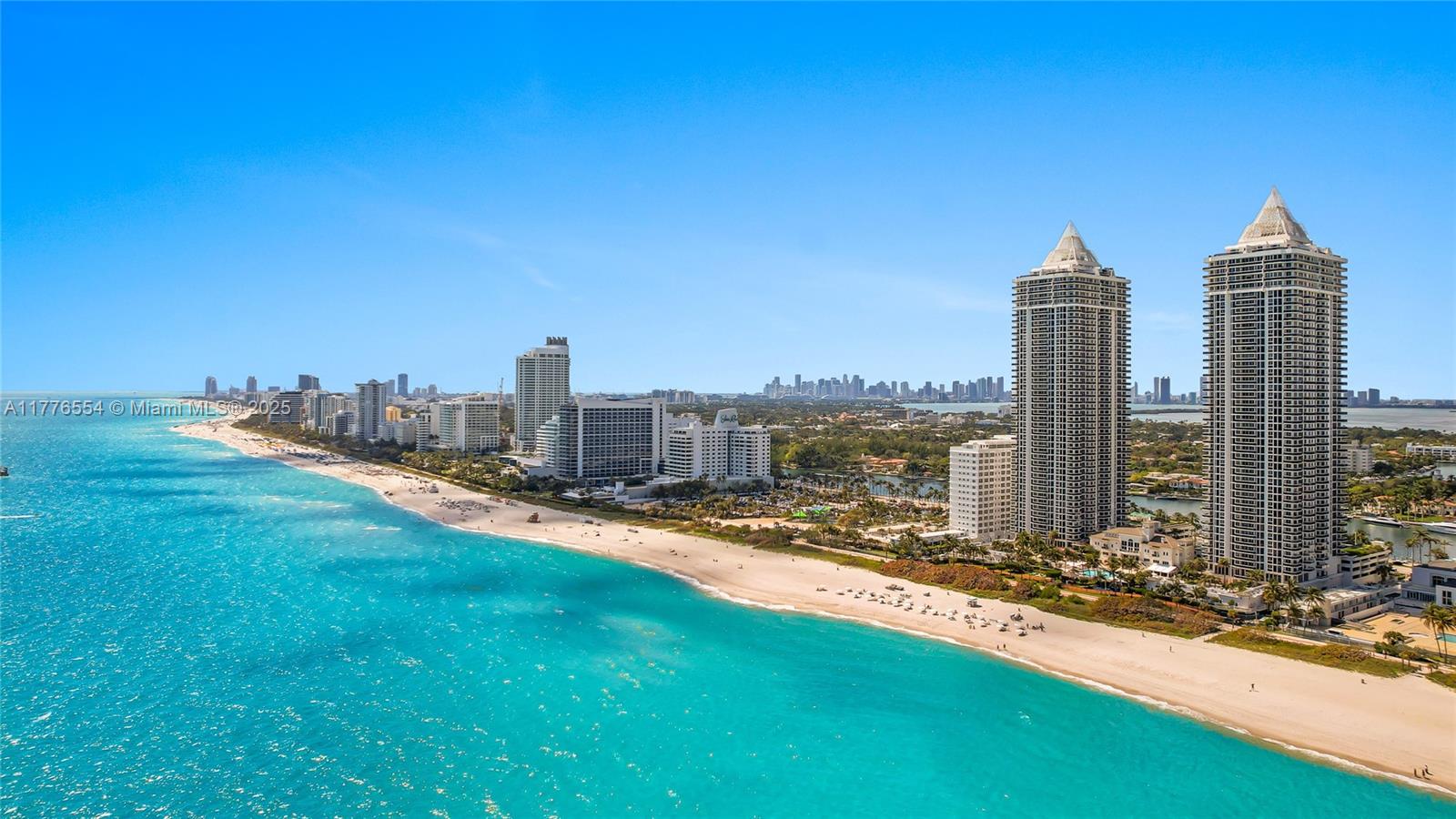 4775 Collins Avenue, Unit 2607 Miami Beach, FL 33140 - Photo 31 of 48 a view of a city with tall buildings and a big yard
