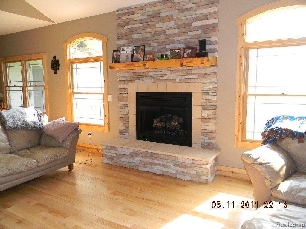 3887 Milner Road Stockbridge, MI 49285 - Photo 2 of 23 Fireplace Great rm