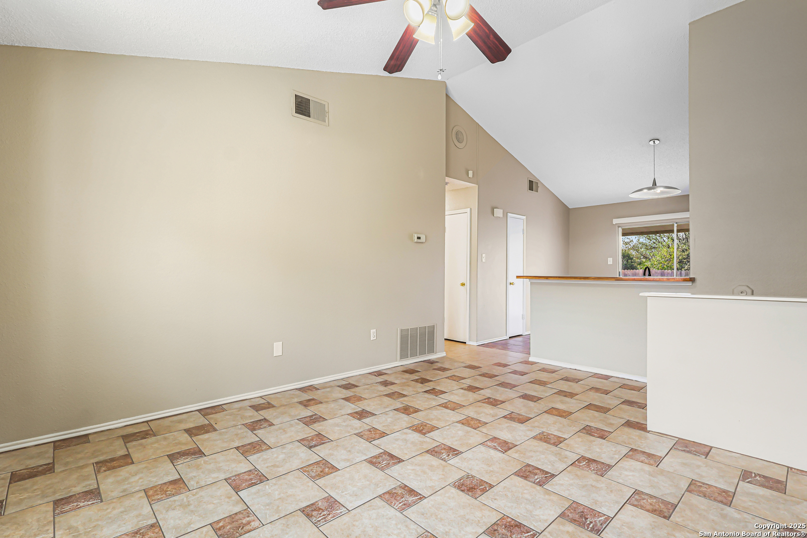 10254 Dover Ridge, Unit 806 San Antonio, TX 78250 - Photo 12 of 13 a bedroom with a bed and a window