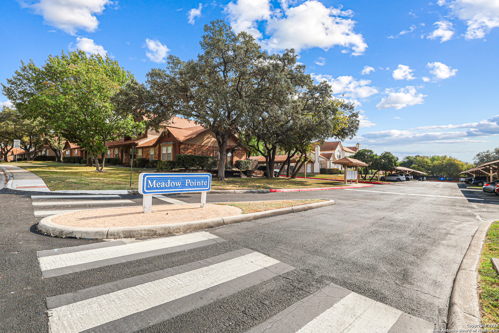 10254 Dover Ridge, Unit 806 San Antonio, TX 78250 - Photo 5 of 13 a view of street with houses