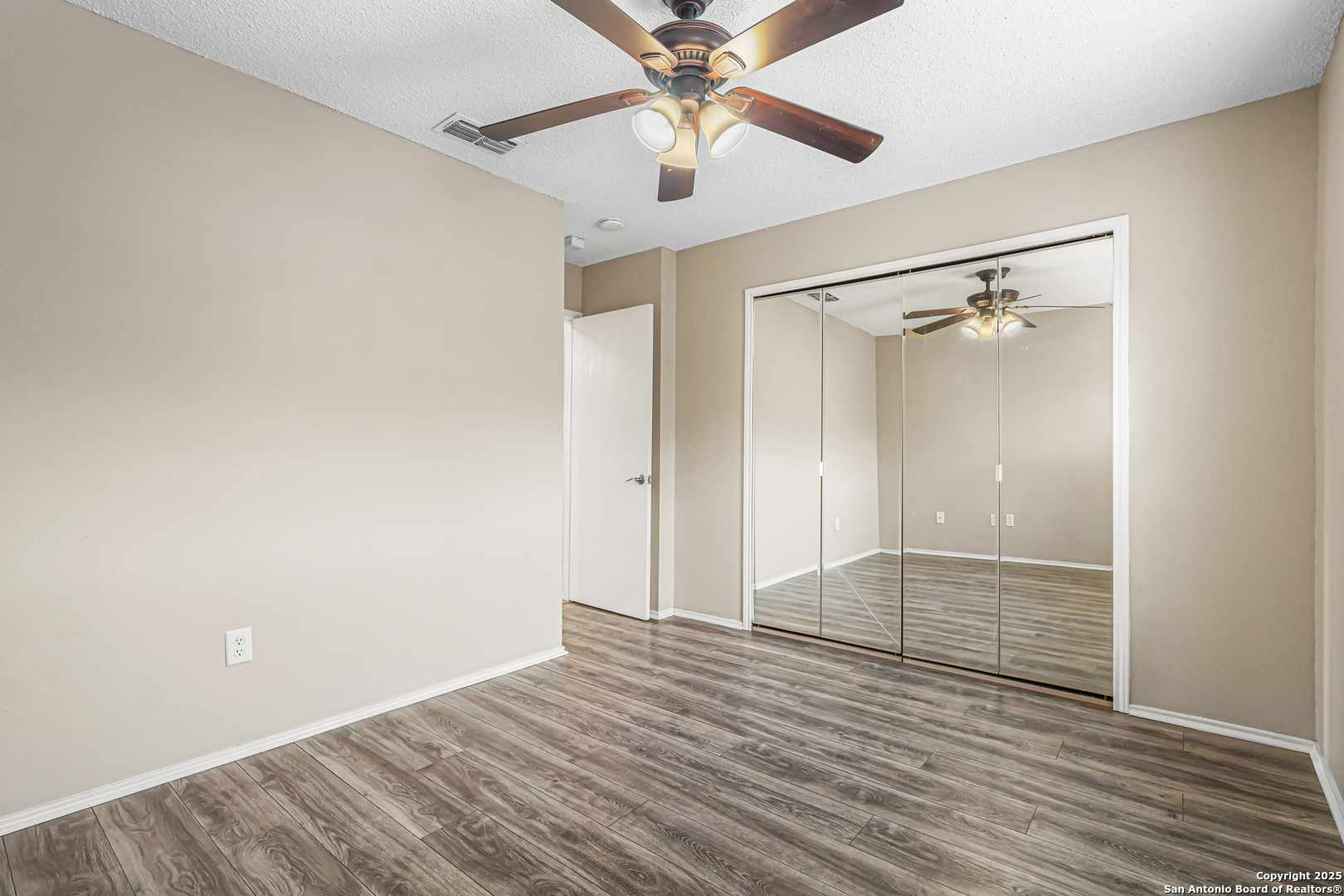 10254 Dover Ridge, Unit 806 San Antonio, TX 78250 - Photo 7 of 13 a view of an empty room