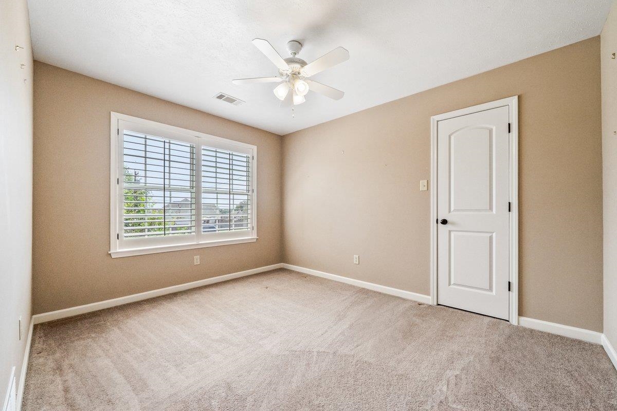 583 Rosemark Road Atoka, TN 38004 - Photo 19 of 25 a view of an empty room with a window