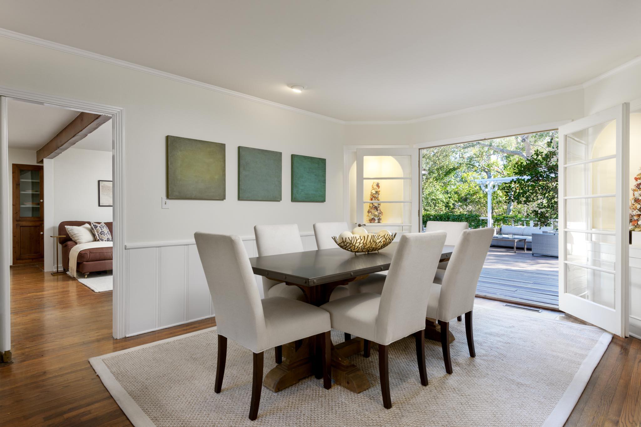 605 San Ysidro Road Montecito, CA 93108 - Photo 11 of 32 a view of a dining room with furniture and wooden floor