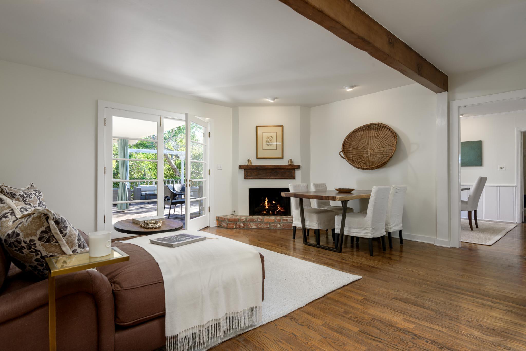 605 San Ysidro Road Montecito, CA 93108 - Photo 13 of 32 a living room with furniture and a fireplace