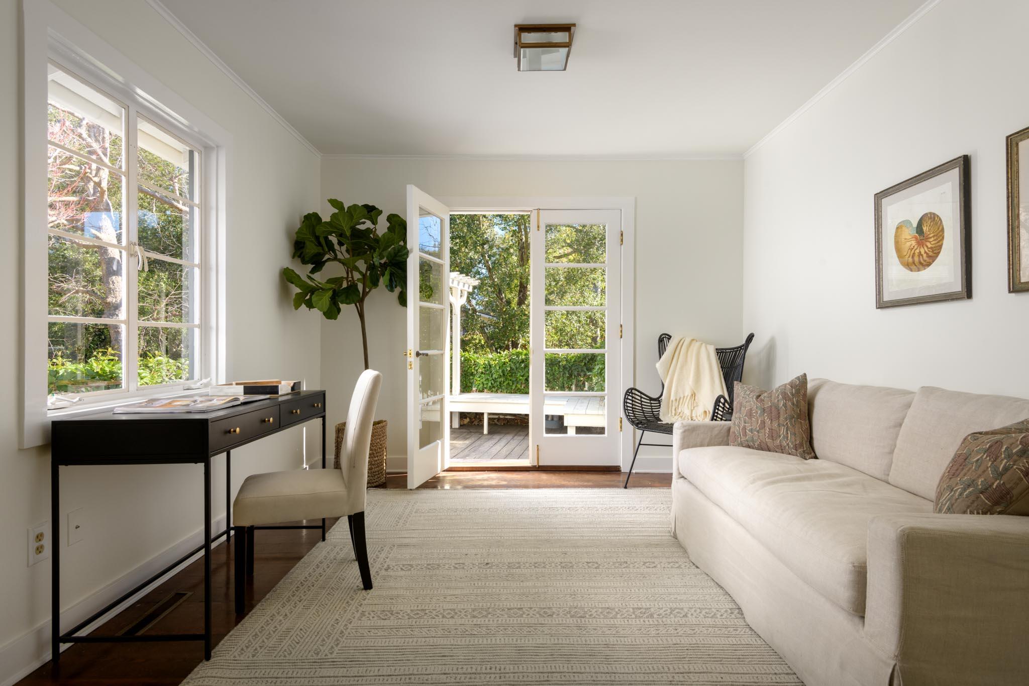 605 San Ysidro Road Montecito, CA 93108 - Photo 23 of 32 a living room with furniture and a large window