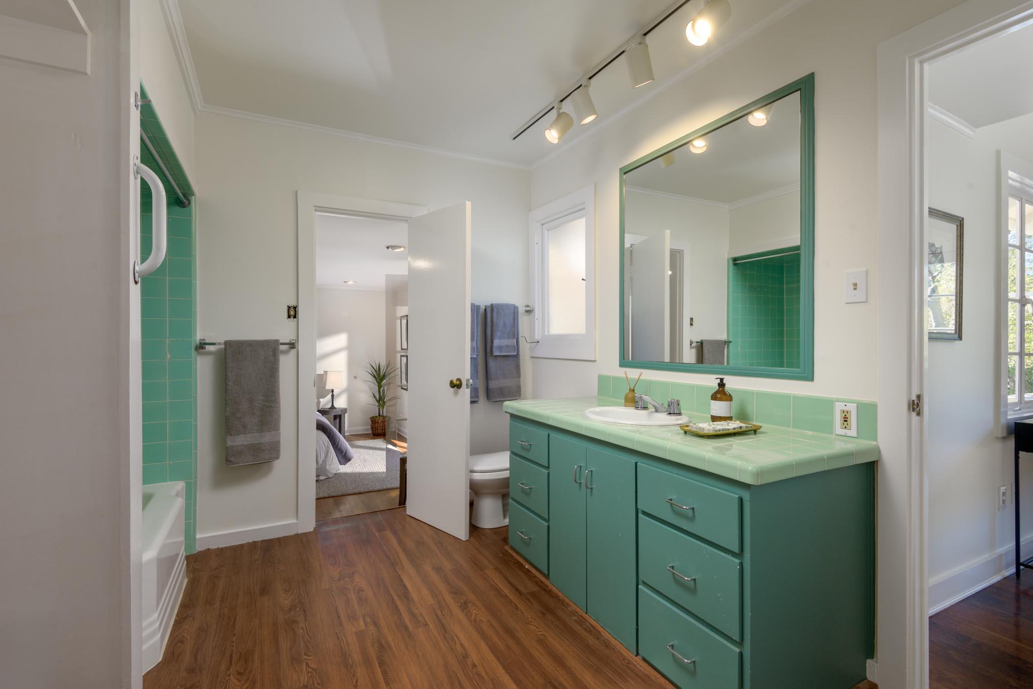 605 San Ysidro Road Montecito, CA 93108 - Photo 24 of 32 a bathroom with a sink and mirror