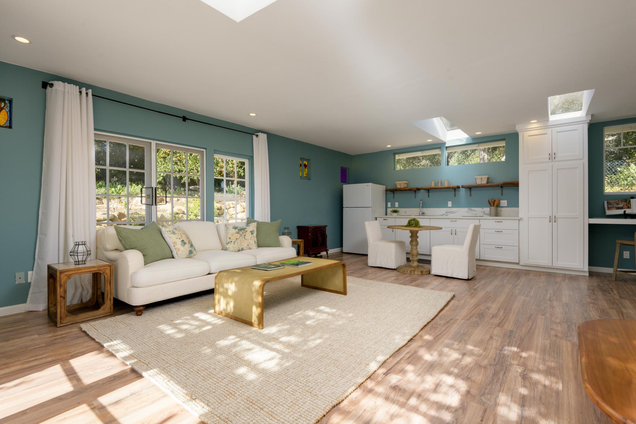 605 San Ysidro Road Montecito, CA 93108 - Photo 26 of 32 a living room with furniture and a large window