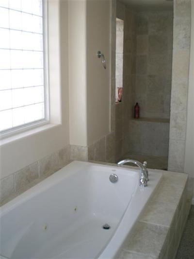3511 Sunset Lane Oxnard, CA 93035 - Photo 9 of 9 a bathroom with a tub and a window