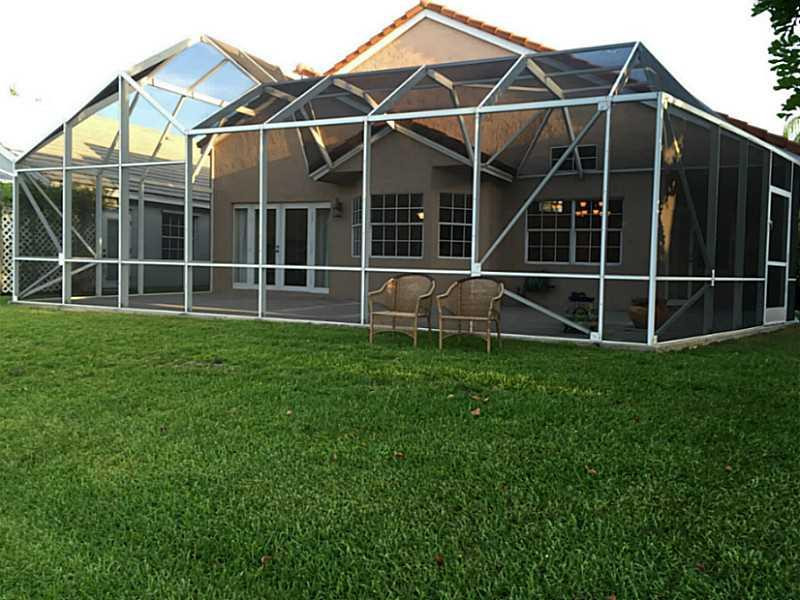 556 Bridgeton Road Weston, FL 33326 - Photo 21 of 26 Exterior Front