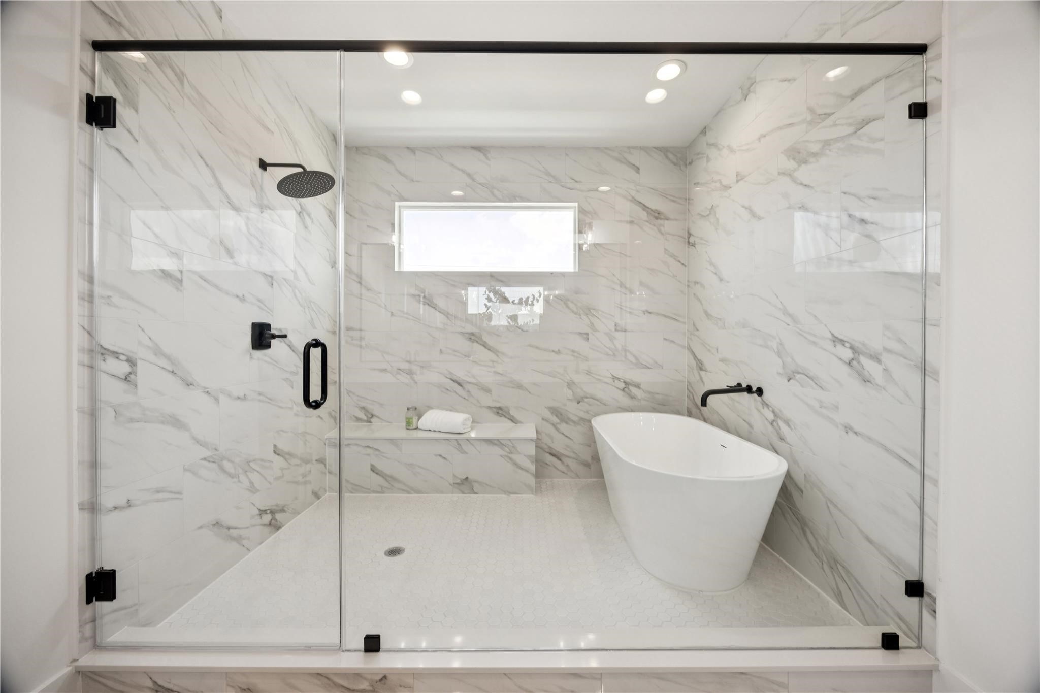 2810 Mills Street Houston, TX 77026 - Photo 20 of 29 a bathroom with a shower and a bathtub