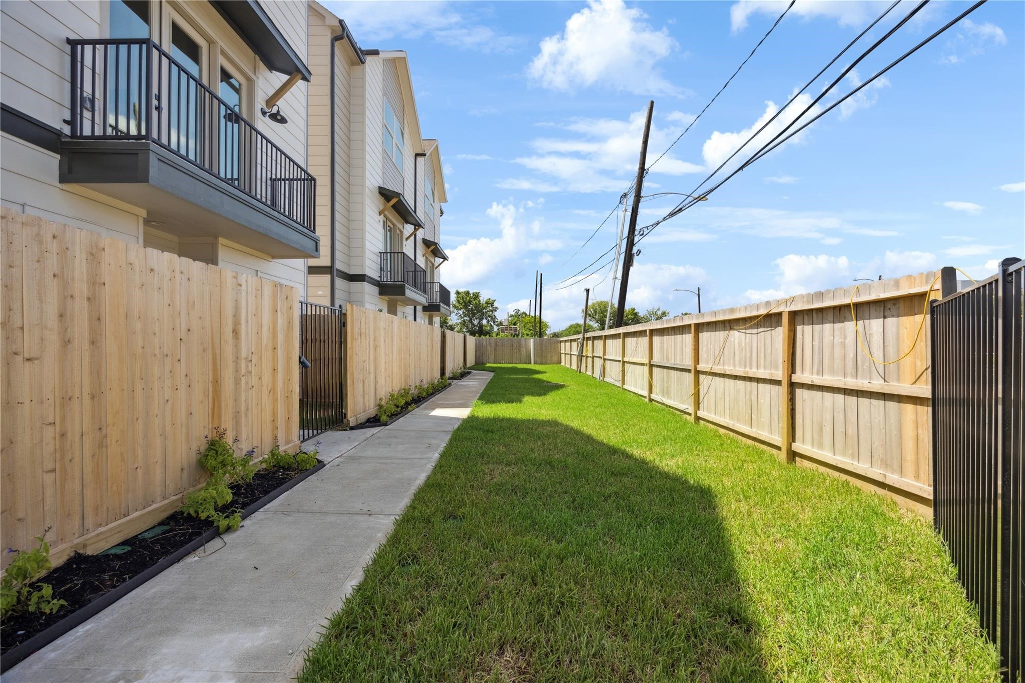 2810 Mills Street Houston, TX 77026 - Photo 28 of 29 a view of backyard with staircase