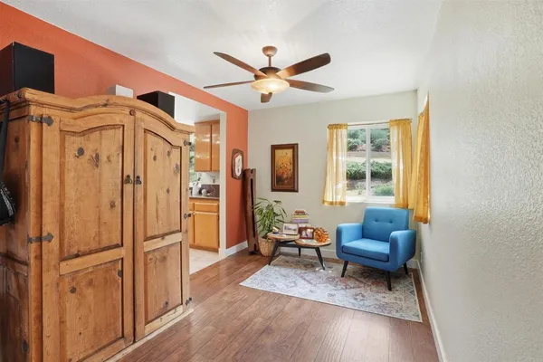 a large kitchen with stainless steel appliances granite countertop a sink and cabinets