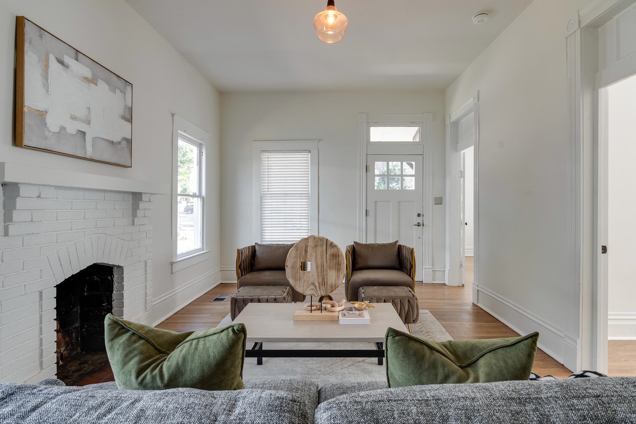 513 South Cox Street Memphis, TN 38104 - Photo 11 of 39 a living room with furniture and a fireplace