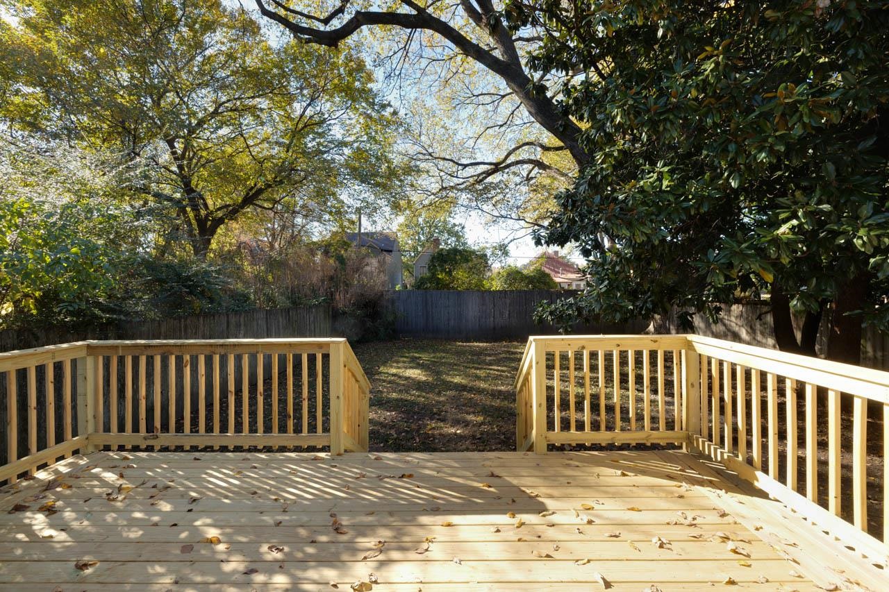 513 South Cox Street Memphis, TN 38104 - Photo 34 of 39 a view of balcony with wooden floor and fence