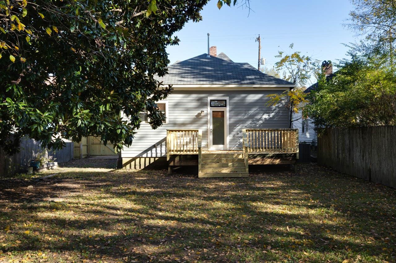 513 South Cox Street Memphis, TN 38104 - Photo 39 of 39 a view of a house with a large tree and a yard