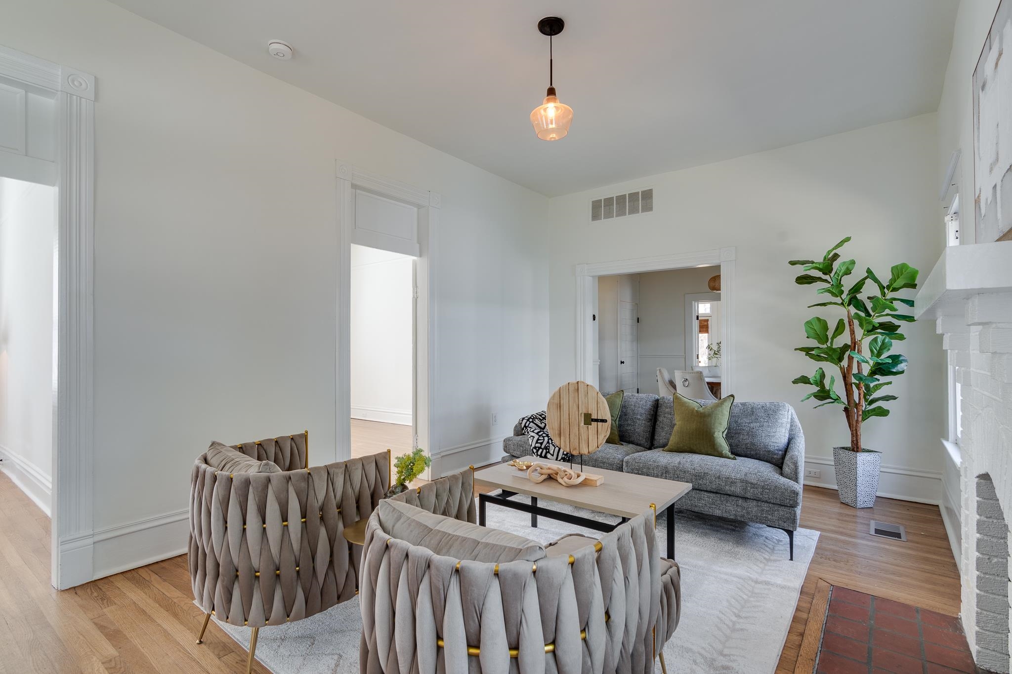 513 South Cox Street Memphis, TN 38104 - Photo 7 of 39 a living room with furniture and a chandelier