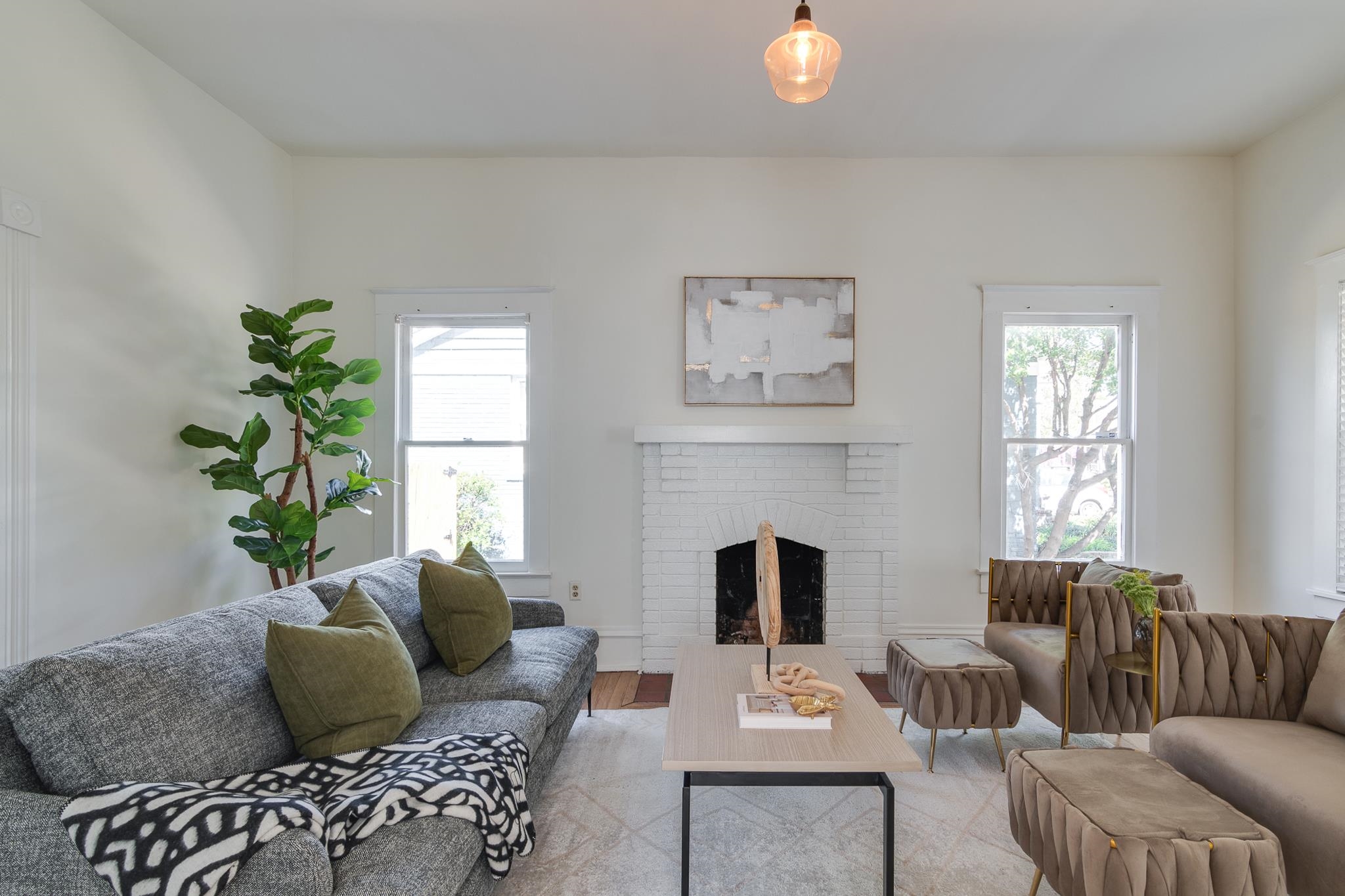 513 South Cox Street Memphis, TN 38104 - Photo 8 of 39 a living room with furniture and a potted plant