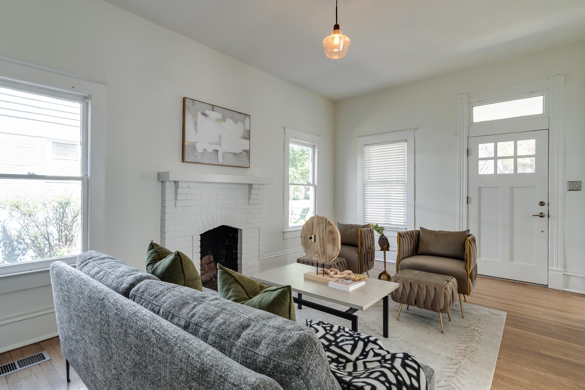 513 South Cox Street Memphis, TN 38104 - Photo 9 of 39 a living room with furniture and a fireplace
