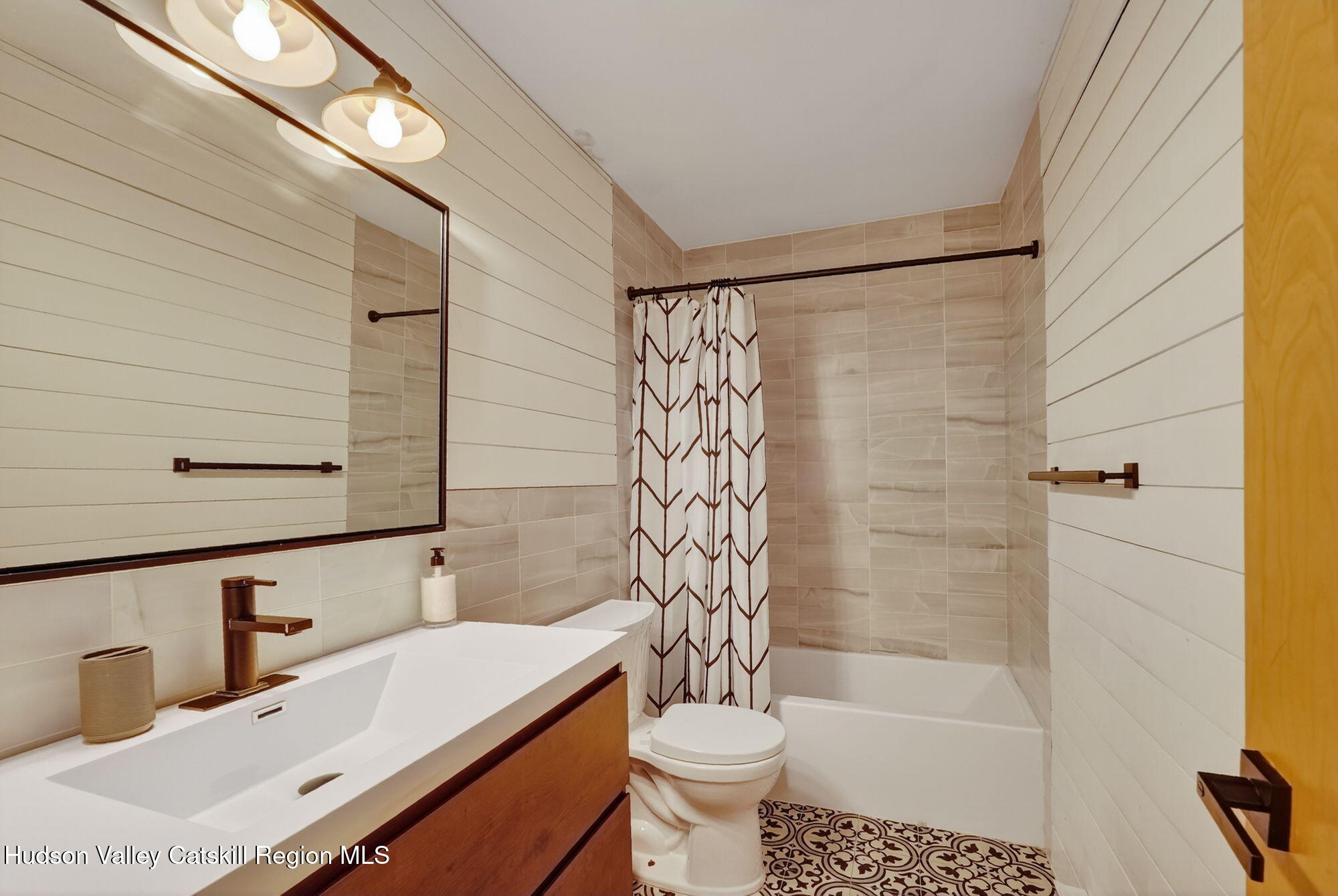 3205 Sleepy Hollow Road Athens, NY 12015 - Photo 17 of 35 a bathroom with a sink a toilet and shower
