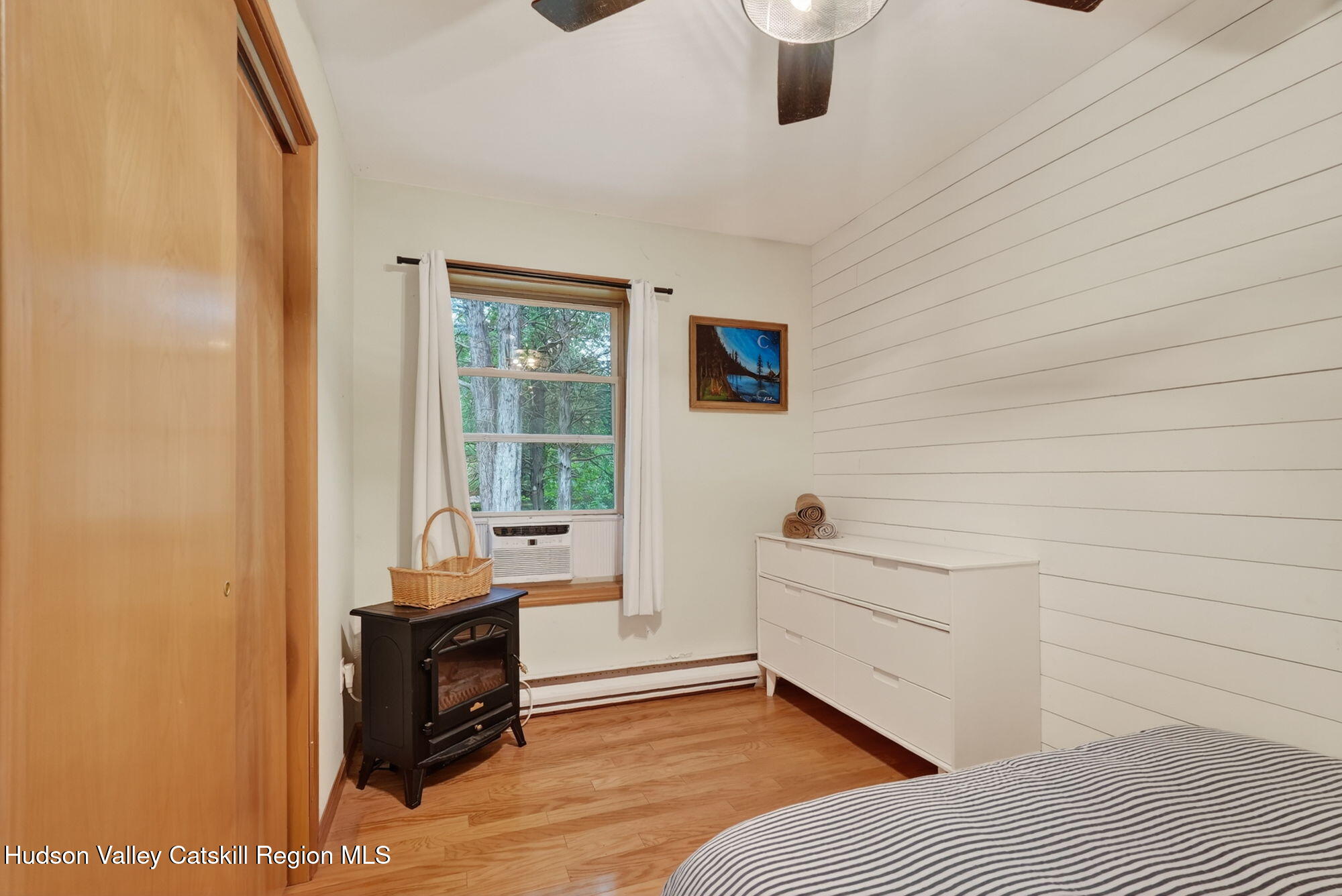 3205 Sleepy Hollow Road Athens, NY 12015 - Photo 18 of 35 a view of a bedroom with furniture and window