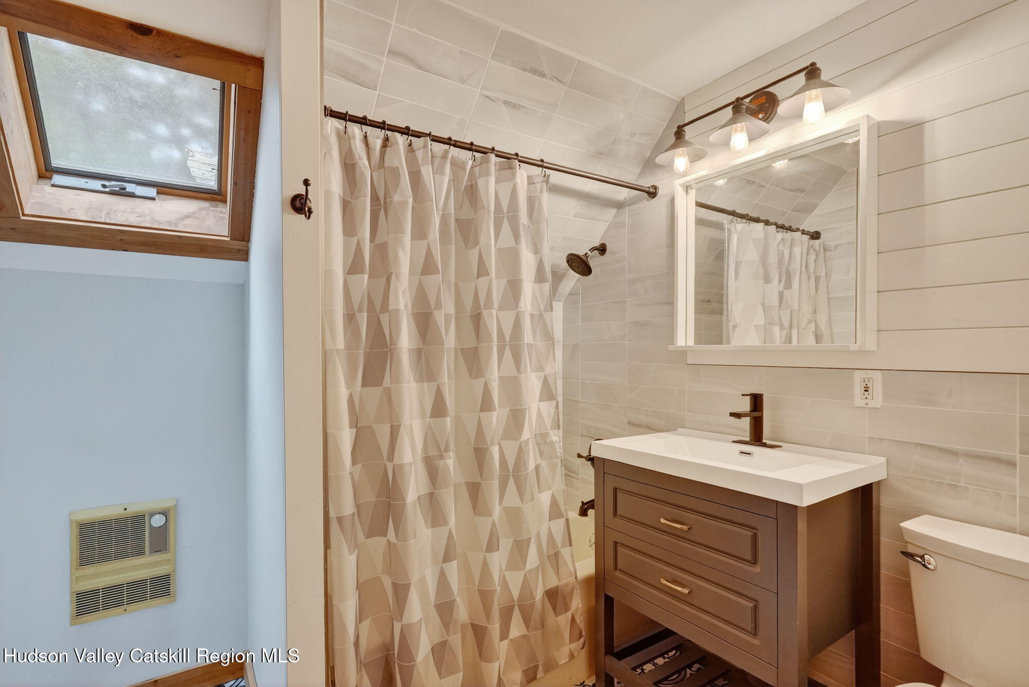 3205 Sleepy Hollow Road Athens, NY 12015 - Photo 26 of 35 a bathroom with a sink and a mirror