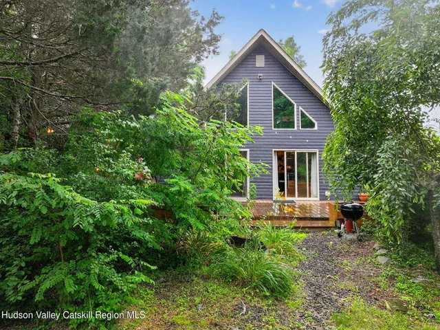 a view of a lake with a yard