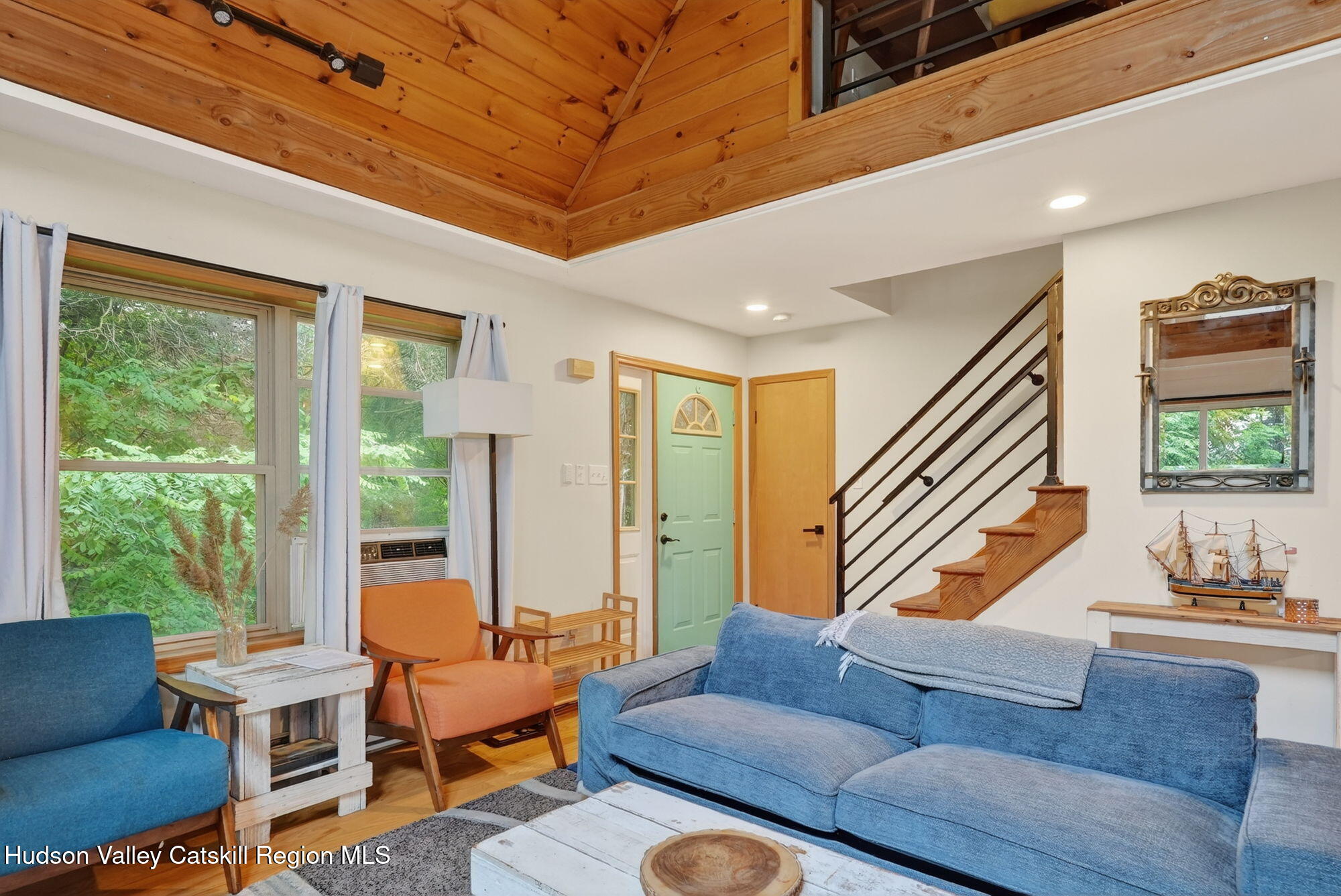 3205 Sleepy Hollow Road Athens, NY 12015 - Photo 8 of 35 a living room with furniture and a large window