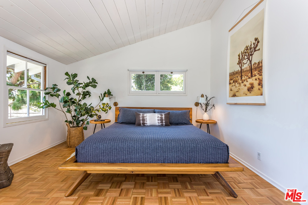 754 Marco Place Venice, CA 90291 - Photo 14 of 39 a bedroom with a bed and a window