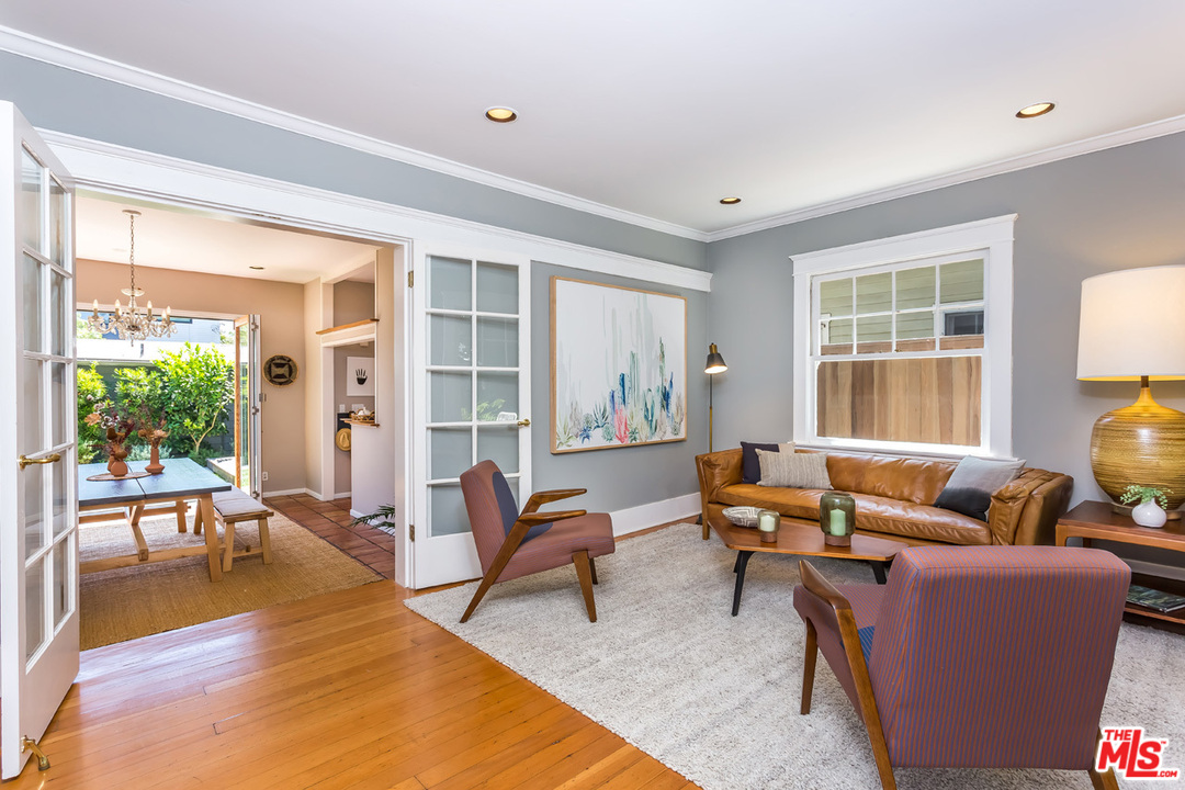 754 Marco Place Venice, CA 90291 - Photo 3 of 39 a living room with furniture and a large window